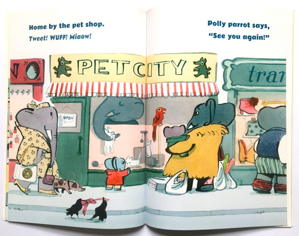 A spread from the book: walking past the pet shop.